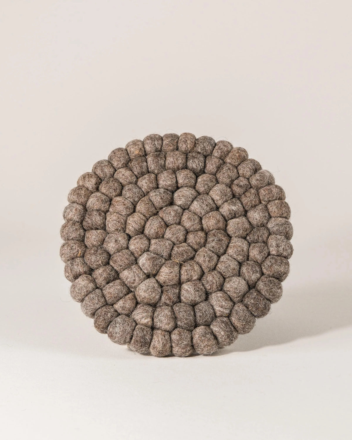 Dessous de plat boule en laine feutrée