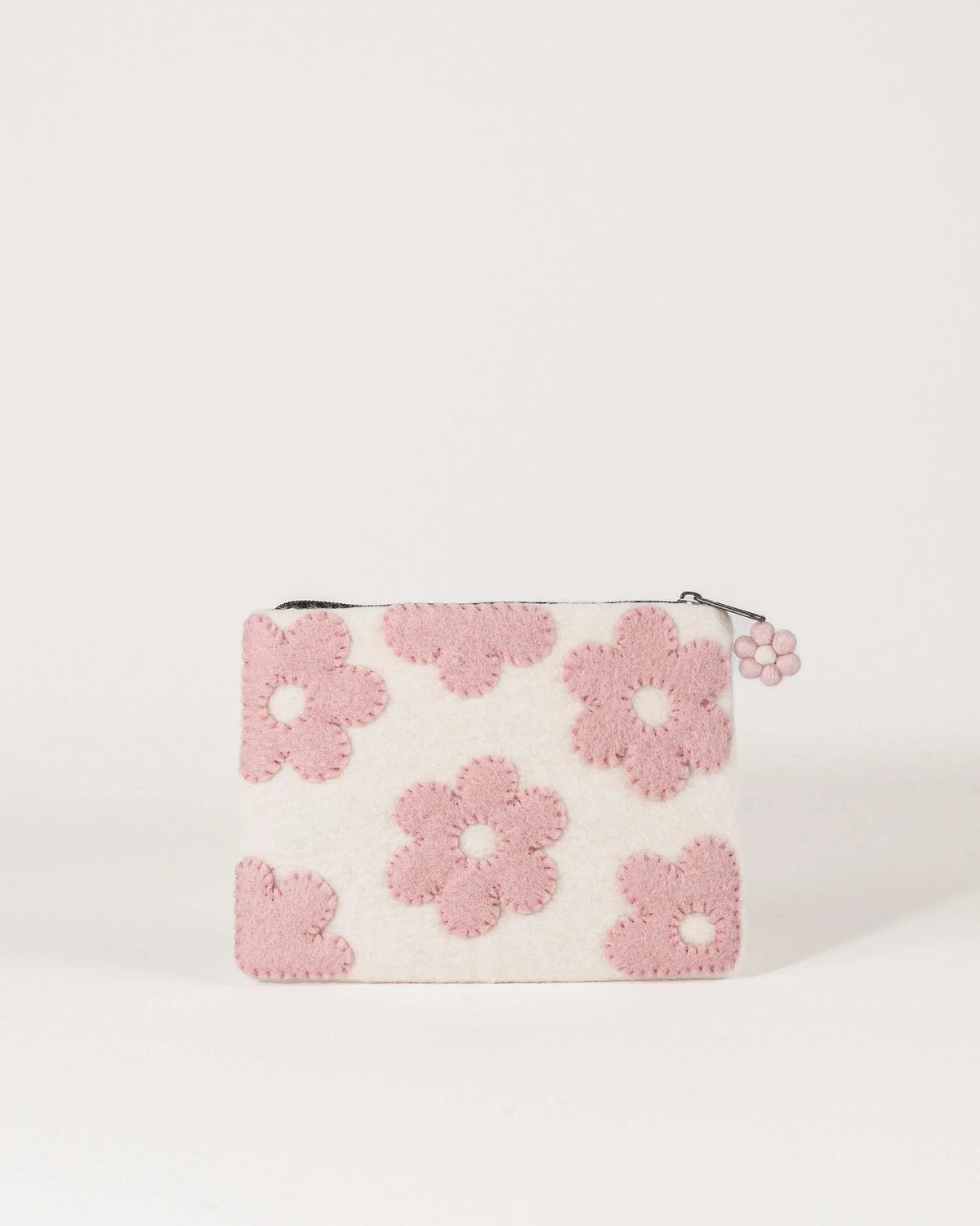 Pochette de rangement en feutrine a motif rose.