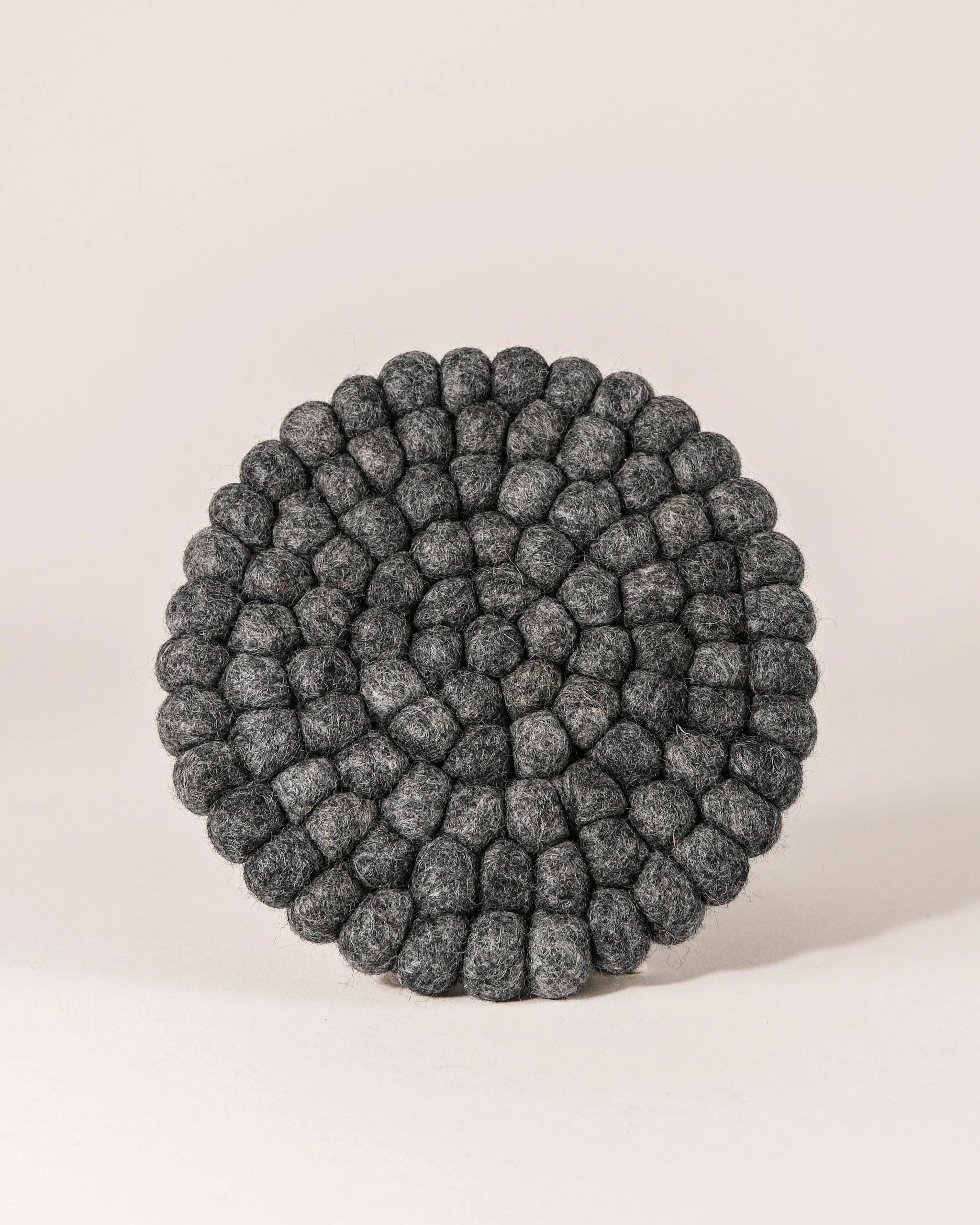 Dessous de plat boule en laine feutrée