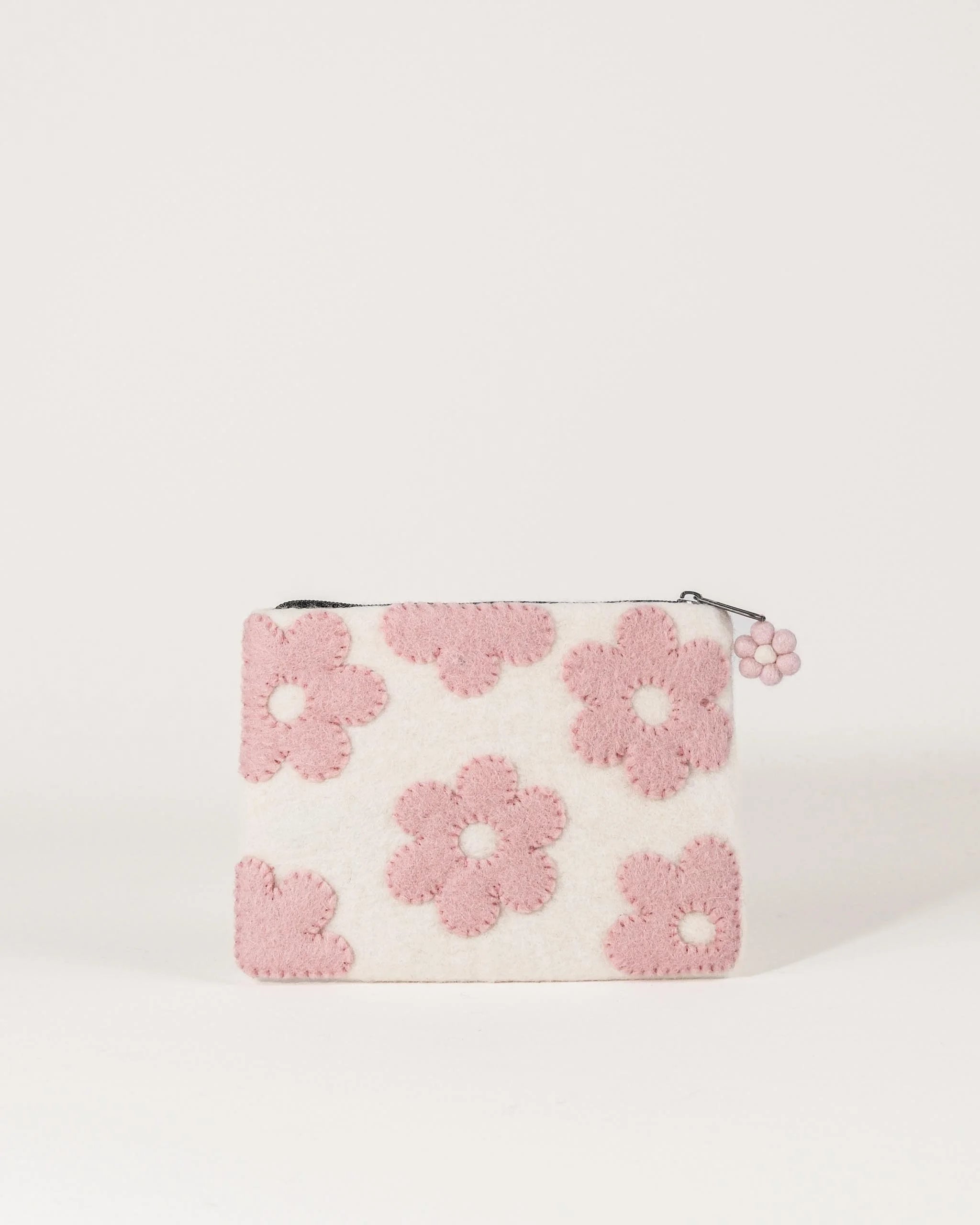 Pochette de rangement en feutrine a motif rose.