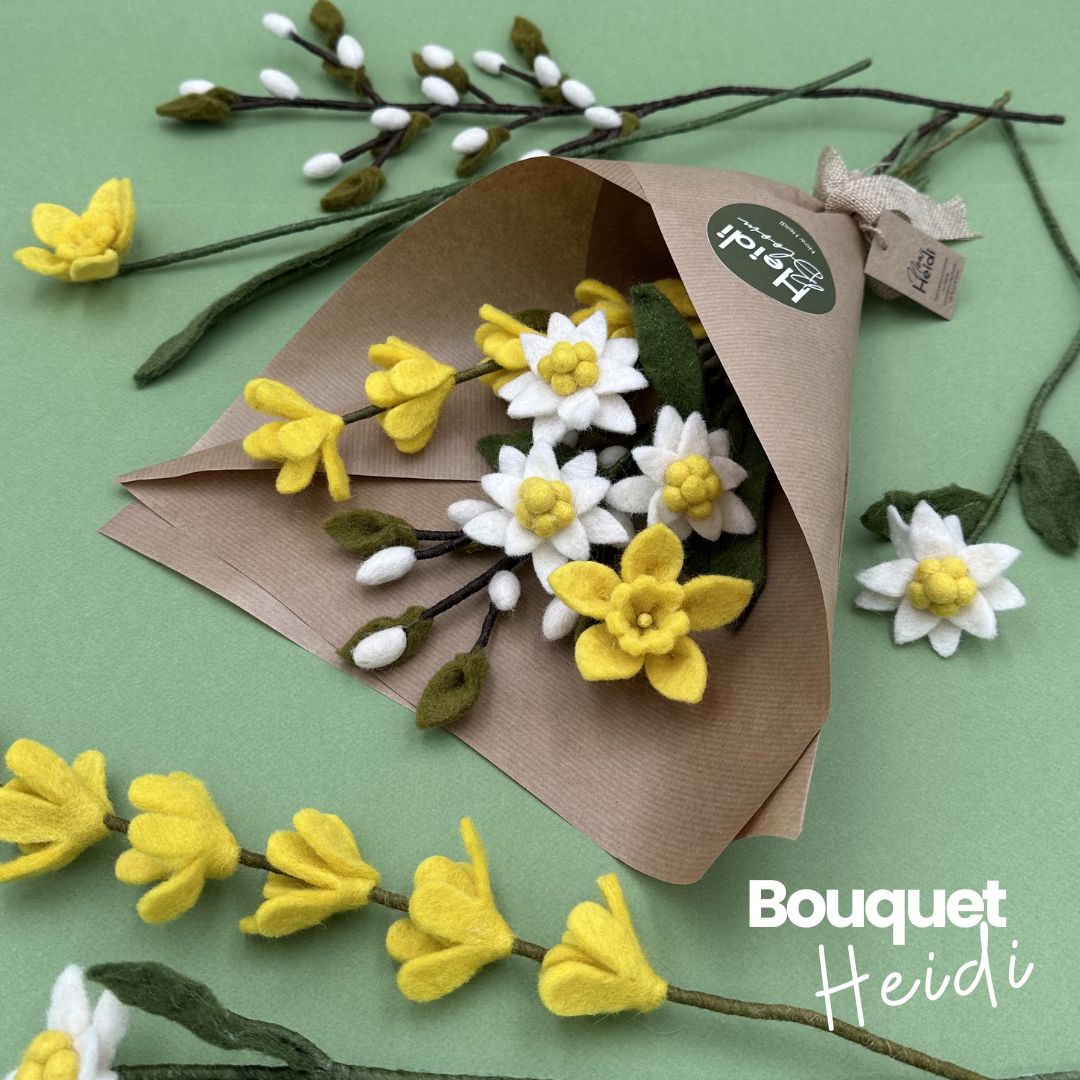 Présentation du bouquet Heidi New Heidi emballé dans du papier kraft avec son étiquette artisanale.