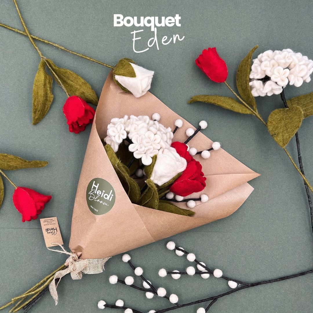 Bouquet Passion Eden New Heidi emballé dans du papier kraft recyclé prêt à offrir.